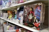  ?? CHRIS PIZZELLO-ASSOCIATED PRESS ?? A doll based on the upcoming Walt Disney Studios film “Mulan” is displayed in the toy section of a Target department store, April 30, 2020, in Glendale, Calif.