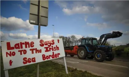  ??  ?? Protest against Brexit border checks and the Northern Ireland protocol at the harbour in Larne, Northern Ireland, on 12 February. Photograph: Clodagh Kilcoyne/Reuters