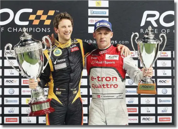  ??  ?? Dynamic duo: Grosjean (left) posing with Kristensen of Denmark after winning the 2012 individual Race Of Champions. — AP