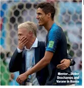  ??  ?? Mentor…Didier Deschamps and Varane in Russia