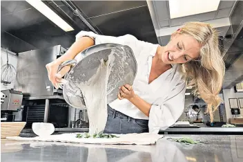  ??  ?? Raising dough: Malin Elmlid and her ‘diva’ sourdough, with yeast born in the heat of the Sinai desert