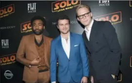  ?? PHOTO BY EVAN AGOSTINI — INVISION — AP ?? Donald Glover, from left, Alden Ehrenreich and Paul Bettany attend a special screening of “Solo: A Star Wars Story” at SVA Theatre on Monday in New York.
