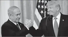  ?? [YURI GRIPAS/ABACA PRESS] ?? President Donald Trump and Israeli Prime Minister Benjamin Netanyahu unveiled the new U.S. peace plan for the Mideast at a White House ceremony Tuesday in Washington.