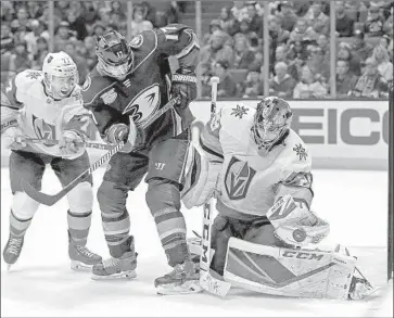  ?? Marcio Jose Sanchez Associated Press ?? VEGAS GOALTENDER Marc-Andre Fleury, right, makes a stop on the Ducks’ Ryan Kesler in second period.