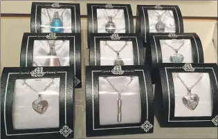  ?? PHOTOS BY PAM FRAMPTON/THE TELEGRAM ?? Pendants for ashes from the Memoria Jewellery line.