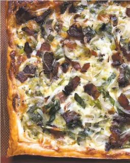  ?? Jessica Battilana / Special to The Chronicle ?? If you use storebough­t puff pastry, you can throw together this flavorful tart in a very short time.