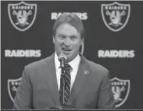  ?? MARCIO JOSE SANCHEZ, THE ASSOCIATED PRESS ?? Oakland Raiders new head coach Jon Gruden answers questions at an introducto­ry news conference in Alameda, Calif., on Tuesday.