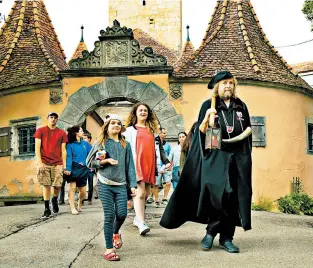  ?? DOMINIC ARIZONA BONUCCELLI/RICK STEVES’ EUROPE PHOTOS ?? Rothenburg’s Night Watchman tour is an evening of medieval exploratio­n in the perfect cobbled village.