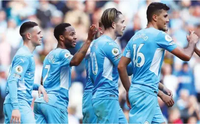  ?? Picture: Getty Images ?? SKY BLUE MARCH. Manchester City players celebrate after Raheem Sterling scored their fifth goal during the English Premier League match against Newcastle United at the Etihad Stadium on Sunday.