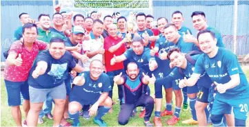  ??  ?? Sabah Legends take one for the album after winning the Charity Shield match at the Sabah Prison Department field yesterday.