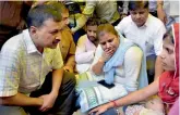  ?? — PTI ?? Chief minister Arvind Kejriwal meets the family members of one of the sanitation workers who died due to asphyxiati­on in a sewer.