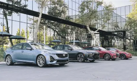  ?? REX TOKESHI-TORRES, EDMUNDS VIA AP ?? The BMW i7, Cadillac CT5-V, Ford Mustang Mach-E and Tesla Model Y. Edmunds tested the hands-free driving assist modes of each vehicle to find out which one worked best.