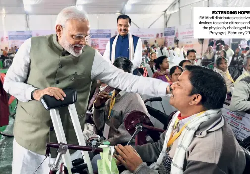  ??  ?? EXTENDING HOPE PM Modi distribute­s assistive devices to senior citizens and the physically challenged in Prayagraj, February 29