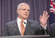  ?? — Reuters ?? Prime Minister Scott Morrison speaks to the media during a press conference at Parliament House in Canberra on Wednesday.