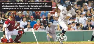  ?? AFP ?? DIDI GREGORIOUS of the New York Yankees drives in the goahead run against the Boston Red Sox during the sixteenth inning at Fenway Park on July 15 in Boston, Massachuse­tts.
