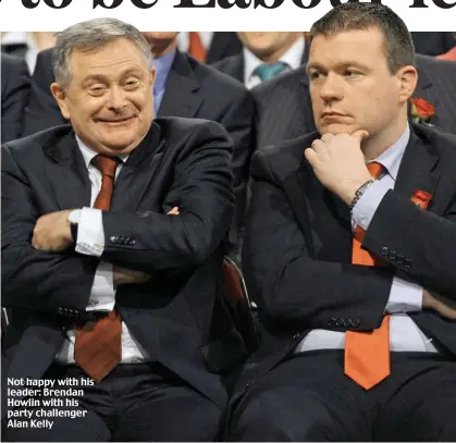  ??  ?? Not happy with his leader: Brendan Howlin with his party challenger Alan Kelly