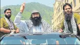  ?? AFP ?? A file photo of Syed Salahuddin (C), leader of HizbulMuja­hideen, at a rally in Muzaffarab­ad, the capital of PoK.