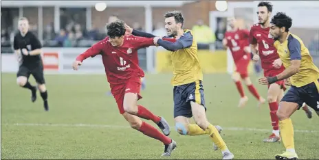  ?? Picture by Ian Hargreaves ?? NO WAY THROUGH Matt Paterson, centre, can’t get past Harrow defender Ben Tricker