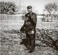  ?? Matthew Busch / Contributo­r ?? Velmil Clay, 76, stands at Hockley-clay Cemetery on the Northeast Side. His father and three brothers are buried there. The cemetery was long forgotten, but its history has been reawakened and needs to be preserved.