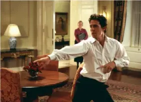  ?? Universal Pictures ?? Hugh Grant’s famous victory dance in the movie “Love, Actually.”