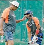  ?? — DC ?? India coach Ravi Shastri with Prithvi Shaw during a training session in Hyderabad on Wednesday.