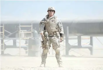  ?? DAVID JAMES/THE ASSOCIATED PRESS ?? WWE superstar John Cena plays an American soldier in The Wall.