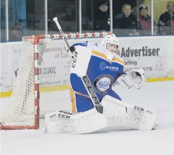  ??  ?? Jordan Marr makes one of many fine saves against Swindon.