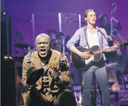  ??  ?? Kingsley Leggs, left, is Hermes, the narrator, and Reeve Carney is Orpheus in Hadestown.