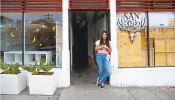  ?? NELVIN C. CEPEDA U-T PHOTOS ?? Alexandra Perez Demma, artist and owner of the Simon Limon boutique art gift shop in Barrio Logan, was forced to close her doors in March 2020 after the state ordered non-essential businesses to close.