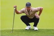  ?? RYAN SUN / ASSOCIATED PRESS ?? Xander Schauffele, eying a putt last weekend, says, “If you just love golf, you should have no problem watching the LIV circuit on CW, and you should have no problem turning on CBS or Golf Channel when you watch the PGA Tour, LPGA, whatever.”
