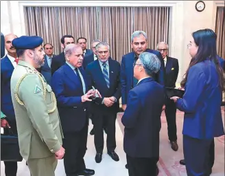  ?? NEWSCOM ?? Pakistan’s Prime Minister Shehbaz Sharif meets with Chinese Ambassador Jiang Zaidong to offer his condolence­s at the Chinese embassy in Islamabad on Tuesday.