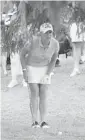  ?? Greg Southam/ Postmedia News ?? Cristie Kerr checks her shot on the 18th hole Friday.