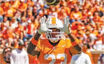  ?? TENNESSEE ATHLETICS PHOTO ?? Tennessee freshman defensive back Boo Carter warms up before Saturday’s Orange & White Game inside Neyland Stadium.