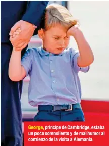  ??  ?? George, príncipe de Cambridge, estaba un poco somnolient­o y de mal humor al comienzo de la visita a Alemania.