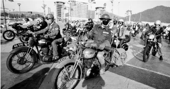  ??  ?? The riders at their pit stop in Amanjaya, Ipoh. - Bernama photo