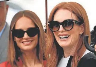  ?? // AFP ?? Natalie Portman (izquierda) y Julianne Moore, ayer en Cannes