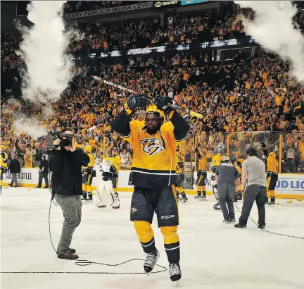  ?? GETTY IMAGES ?? P.K. Subban celebrates after his Nashville Predators swept away the top-ranked Chicago Blackhawks in the opening round of the Stanley Cup playoffs. In the playoffs, Subban said, he gets “a certain feeling that just makes the game fun and makes me want...