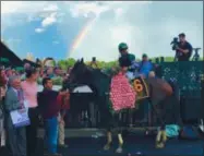  ?? PROVIDED ?? A rainbow shone overhead after New York-bred Diversify registered a 3½-length victory in the Grade 1, $1.2 million Whitney on Aug. 4. The jockey is Irad Ortiz Jr., who clinched his second Angel Cordero Jr. riding title this year with 52 wins.