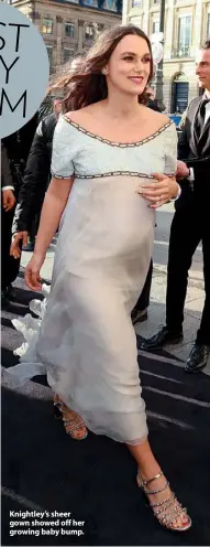  ??  ?? Knightley’s sheer gown showed off her growing baby bump.