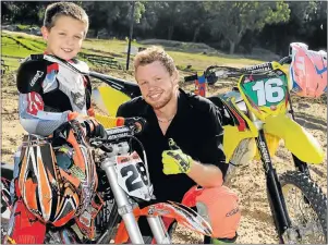  ?? Picture: MIKE HOLMES ?? GEARED TO GO: Revving up for Saturday's Monster Energy South African Motocross Nationals at the Rover Track on Victoria Drive are eight-year-old Kyle Townsend (50cc class) and Andrew Wren, 19 (250cc and 450cc class)