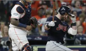  ?? DAVID J. PHILLIP - THE ASSOCIATED PRESS ?? Cleveland Indians’ Jason Kipnis, right, reacts as he strikes out to end the eighth inning of Game 2of a baseball American League Division Series against the Houston Astros,