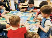  ?? PHOTO PROVIDED ?? Children in the Pre-K in the Park pre-school program learned about art and science by painting signs for a recent March for Science in Saratoga Springs.