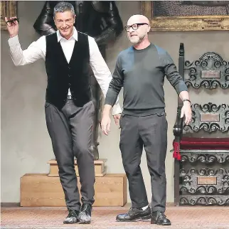  ??  ANTONIO CALANNI/THE ASSOCIATED PRESS FILES ?? Stefano Gabbana, left, and Domenico Dolce triggered a boycott call of their fashions after the pair said they opposed gay adoptions and in-vitro fertilizat­ion.