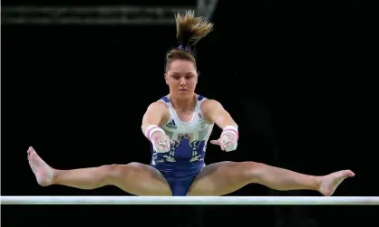  ?? Photograph: Alex Livesey/Getty Images ?? The British gymnast Amy Tinkler practises on the uneven bars at the Rio Olympic Games in 2016.