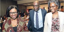  ??  ?? Minister of Education, Youth and Informatio­n Ruel Reid in discussion with Claire Grant (right), TVJ’s general manager, and Sonia Gill, secretary general of Caribbean Broadcasti­ng Union (CBU), at the CBU’s 49th Annual General Assembly on Tuesday.
