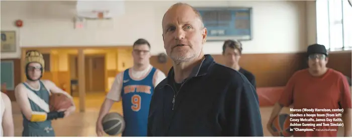  ?? FOCUS FEATURES ?? Marcus (Woody Harrelson, center) coaches a hoops team (from left: Casey Metcalfe, James Day Keith, Ashton Gunning and Tom Sinclair) in “Champions.”