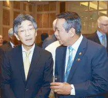  ??  ?? Japanese Ambassador Kazuhide Ishikawa and Frank Evaristo.