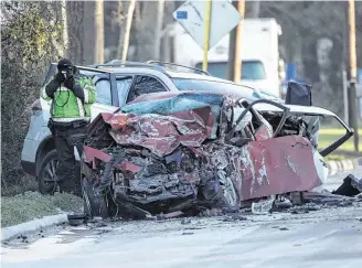  ?? Yi-Chin Lee / Staff photograph­er ?? Officials say a spilled load of cement caused a driver to lose control of his car, jump the median and hit an SUV head-on Friday near Old Humble and Bender roads in Humble.