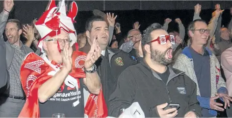  ?? BOB TYMCZYSZYN/POSTMEDIA NETWORK ?? Supporters gathered at FirstOntar­io Performing Arts Centre in St. Catharines react to the announceme­nt Thursday by the Canada Games Council and Province of Ontario, that Niagara will host the 2021 Canada Summer Games.
