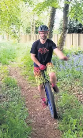  ??  ?? Wheel-y good fun Stuart on his unicycle